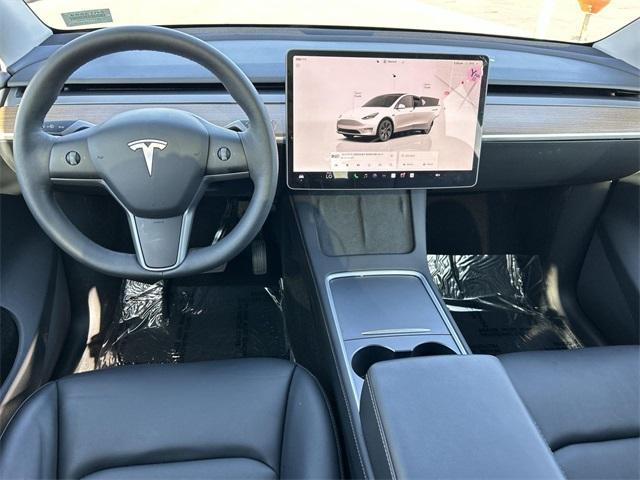 used 2024 Tesla Model Y car, priced at $34,443