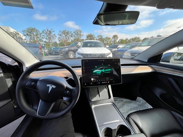 used 2023 Tesla Model 3 car, priced at $26,357