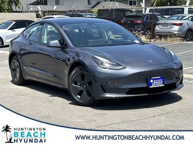 used 2023 Tesla Model 3 car, priced at $26,357