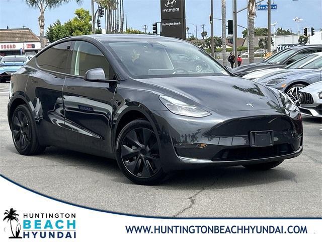 used 2025 Tesla Model Y car, priced at $39,882
