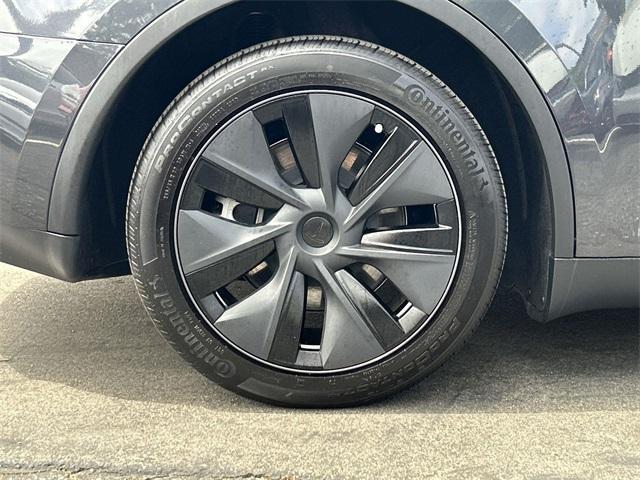 used 2025 Tesla Model Y car, priced at $38,992