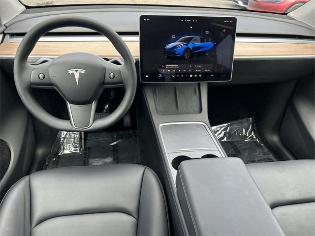 used 2025 Tesla Model Y car, priced at $38,992
