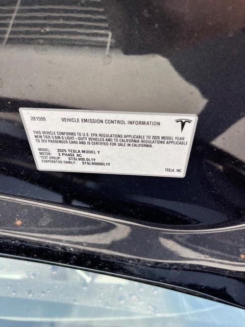 used 2025 Tesla Model Y car, priced at $39,882