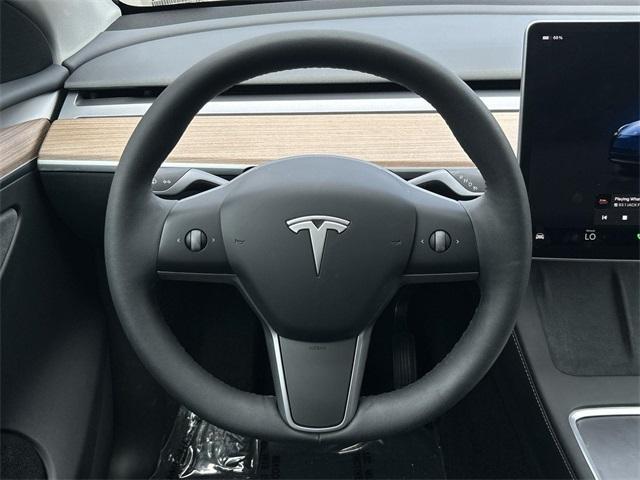used 2025 Tesla Model Y car, priced at $38,992
