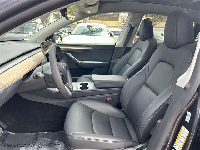 used 2025 Tesla Model Y car, priced at $38,992