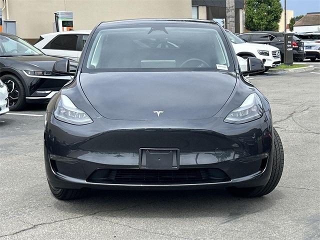 used 2025 Tesla Model Y car, priced at $38,992