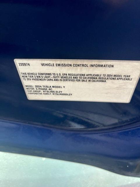 used 2024 Tesla Model Y car, priced at $34,992