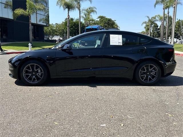 used 2023 Tesla Model 3 car, priced at $25,800