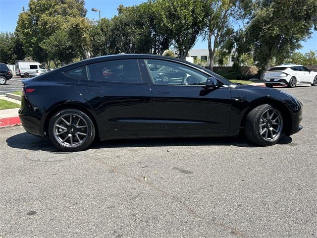 used 2023 Tesla Model 3 car, priced at $25,800
