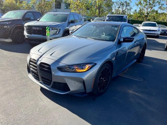 used 2023 BMW M4 car, priced at $84,000