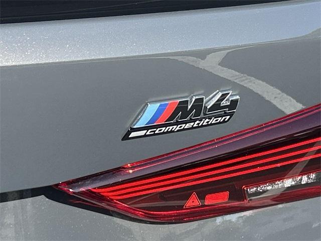 used 2025 BMW M4 car, priced at $83,000