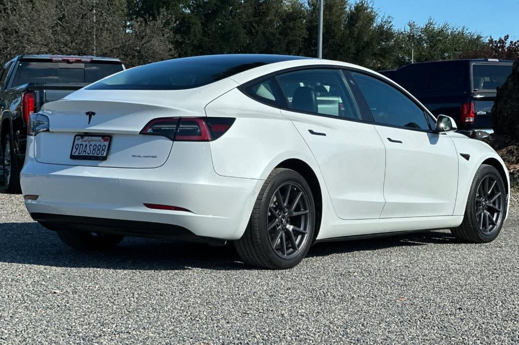 used 2022 Tesla Model 3 car, priced at $26,352