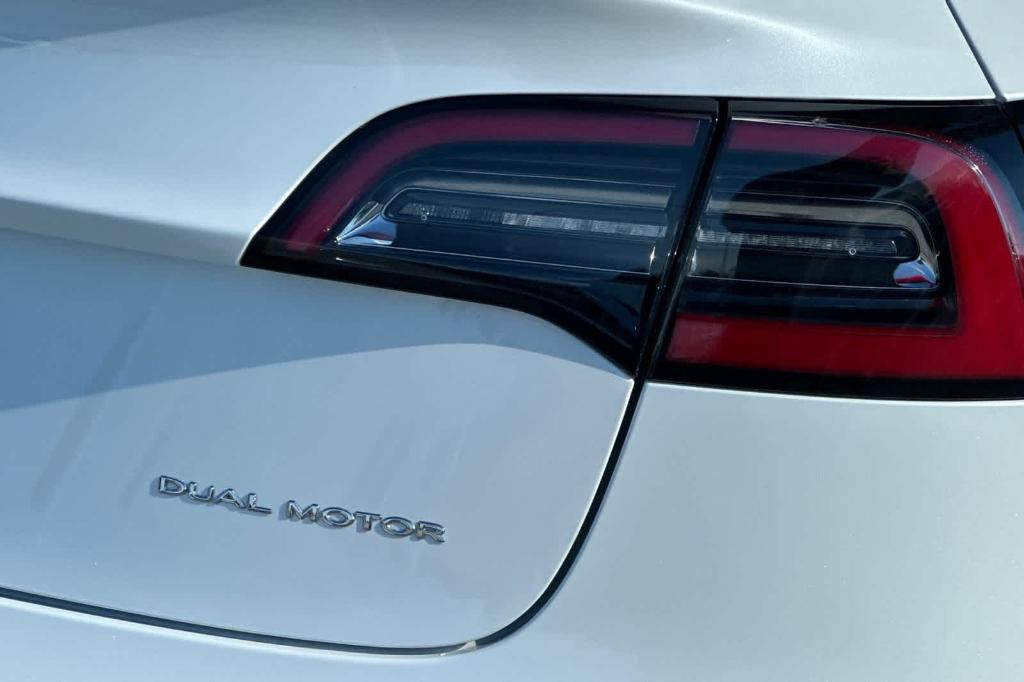 used 2022 Tesla Model 3 car, priced at $26,352
