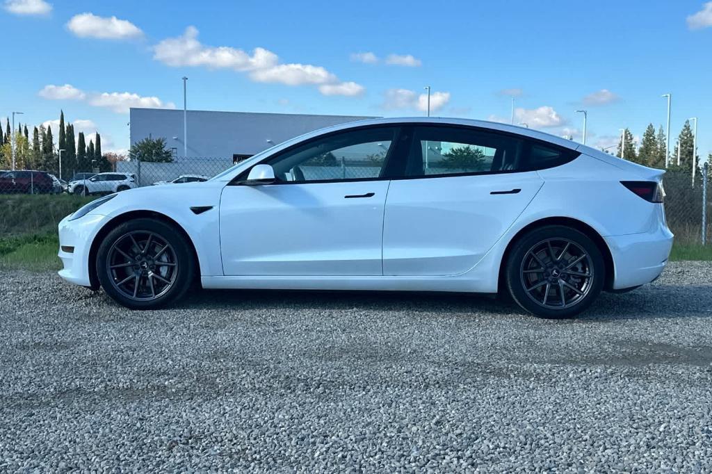 used 2022 Tesla Model 3 car, priced at $26,352