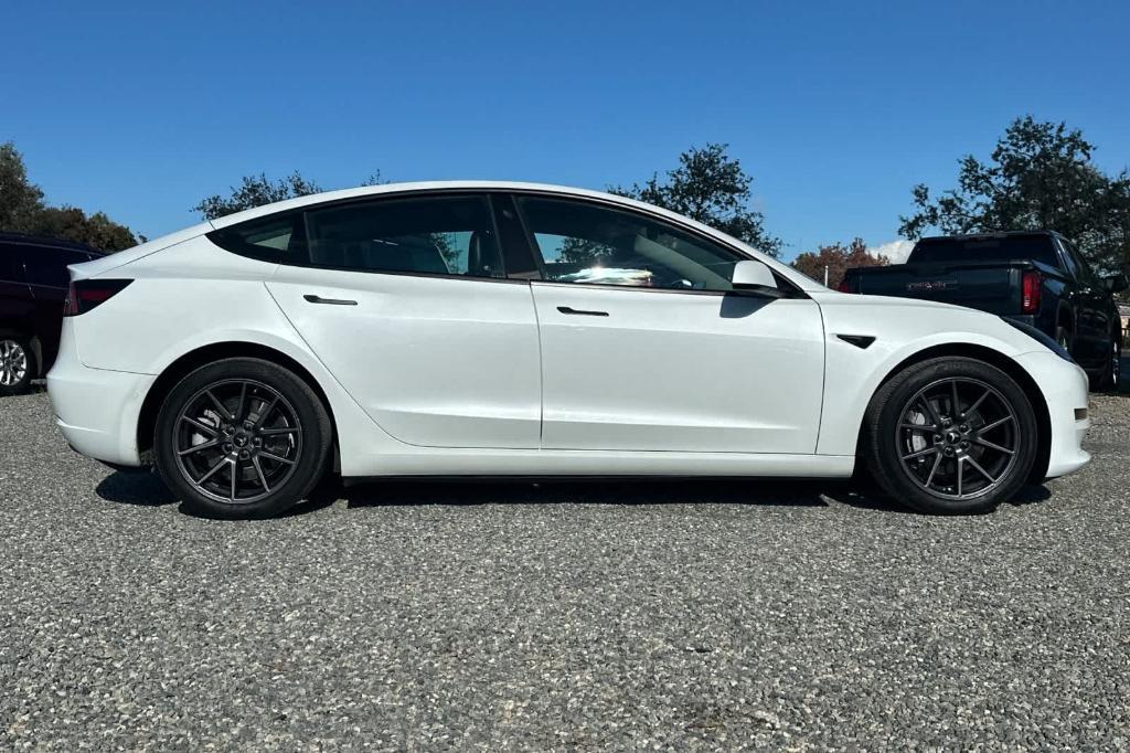 used 2022 Tesla Model 3 car, priced at $26,352