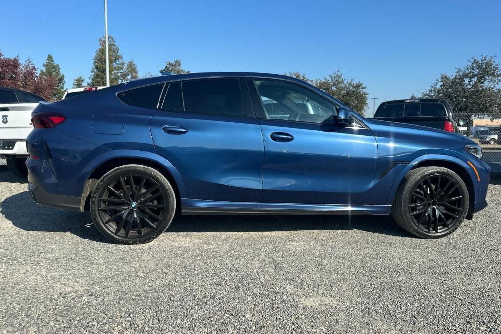 used 2023 BMW X6 car, priced at $52,931