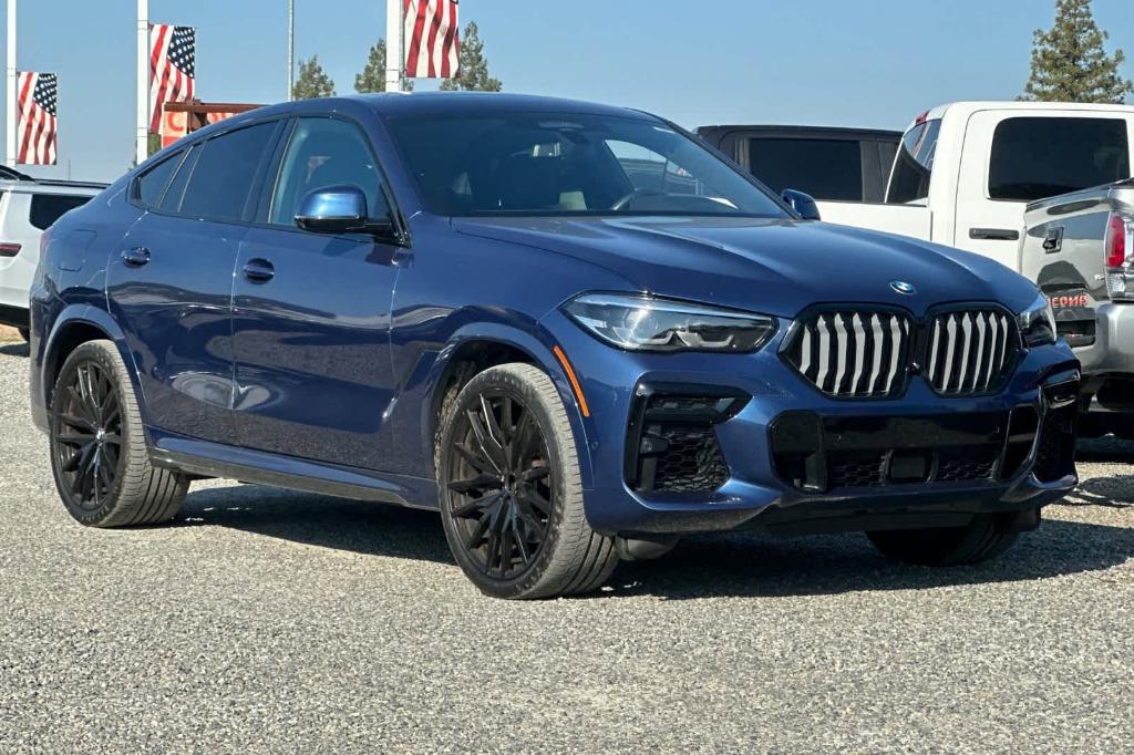 used 2023 BMW X6 car, priced at $52,931