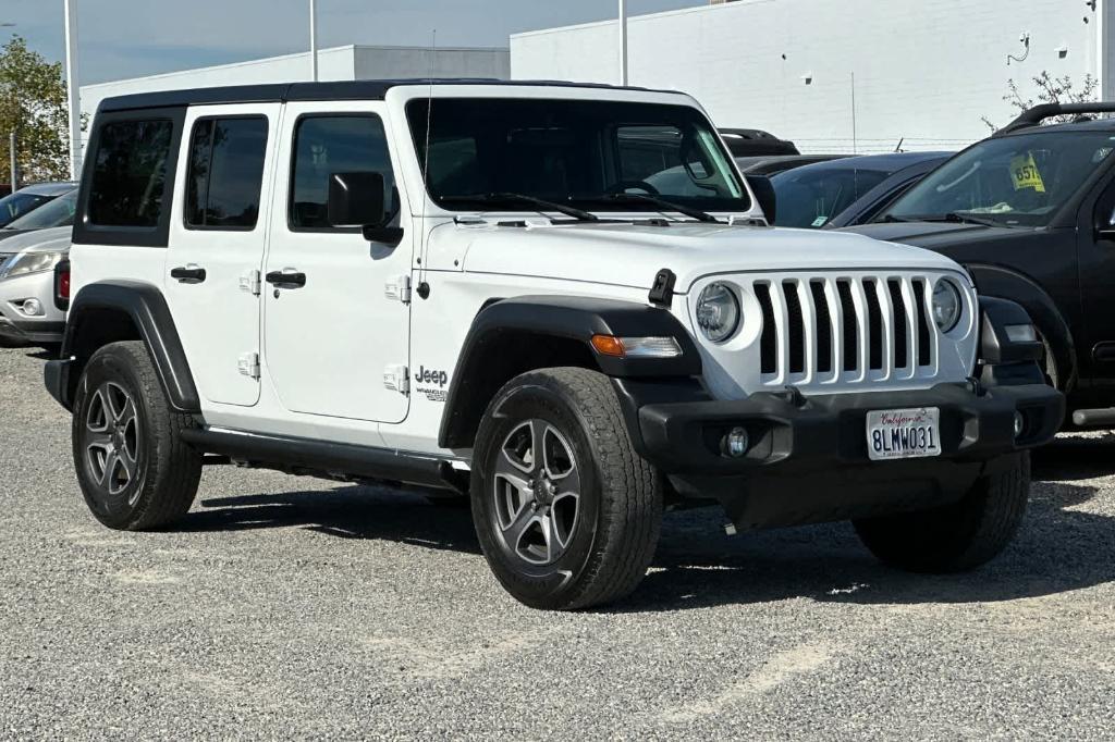 used 2018 Jeep Wrangler Unlimited car, priced at $19,828