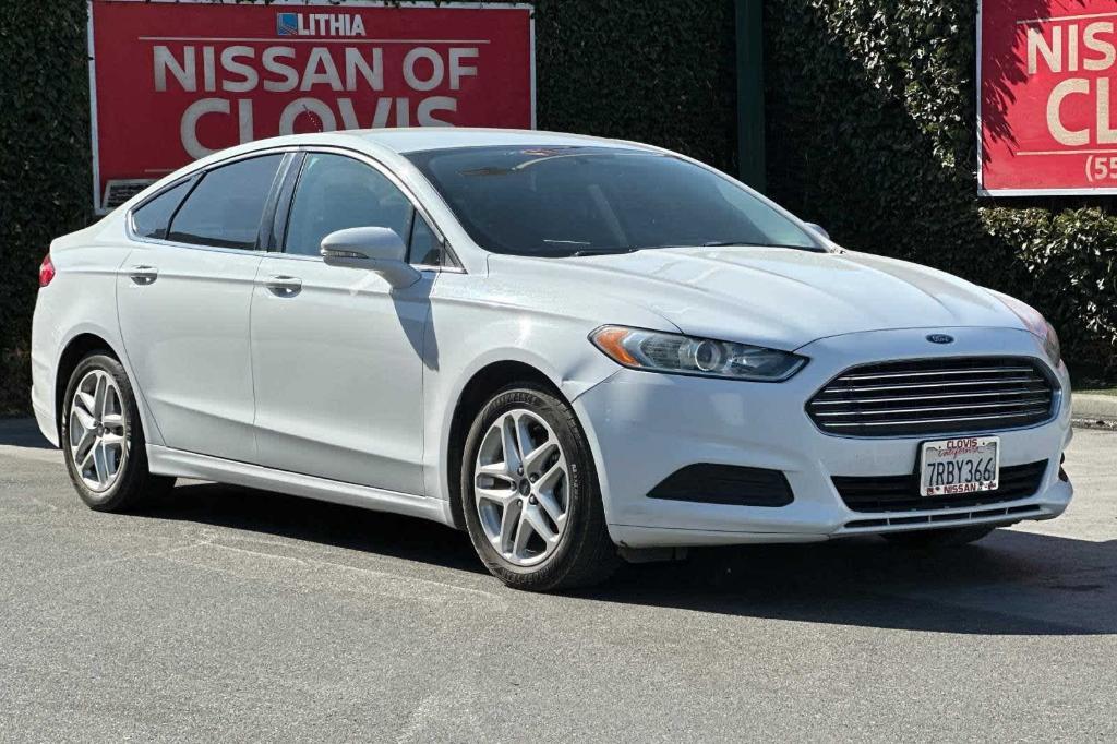 used 2016 Ford Fusion car, priced at $7,999