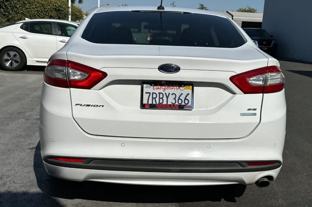 used 2016 Ford Fusion car, priced at $7,999