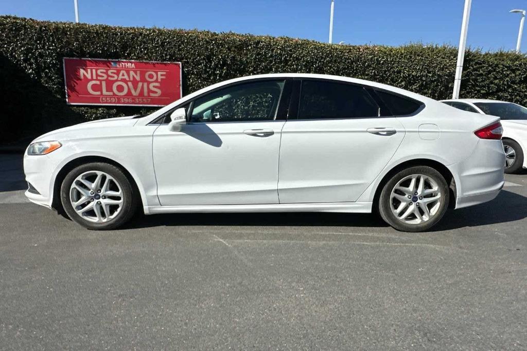 used 2016 Ford Fusion car, priced at $7,999