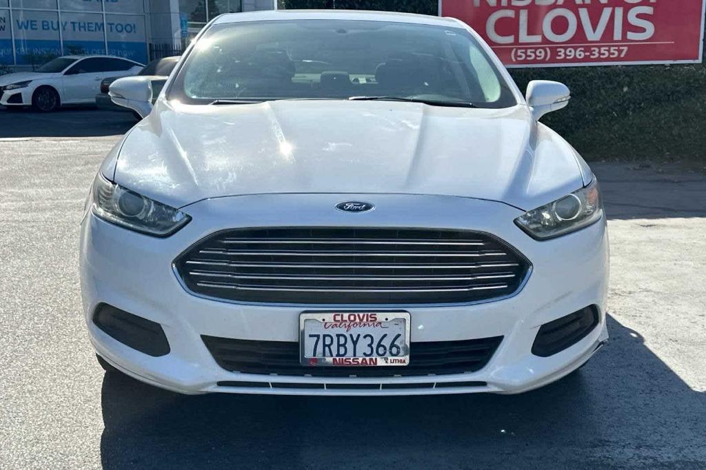 used 2016 Ford Fusion car, priced at $7,999