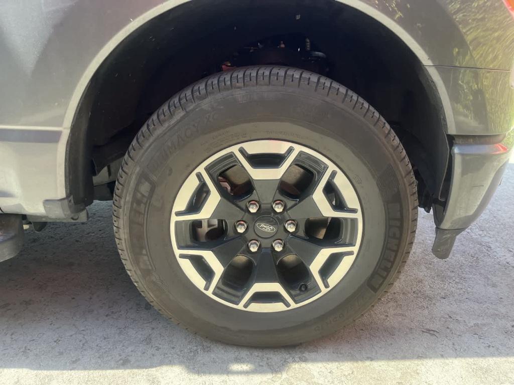 used 2023 Ford F-150 Lightning car, priced at $44,403