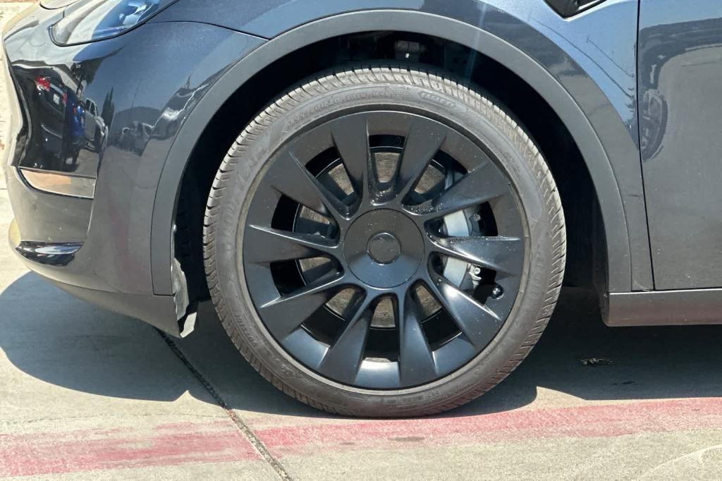 used 2024 Tesla Model Y car, priced at $35,891