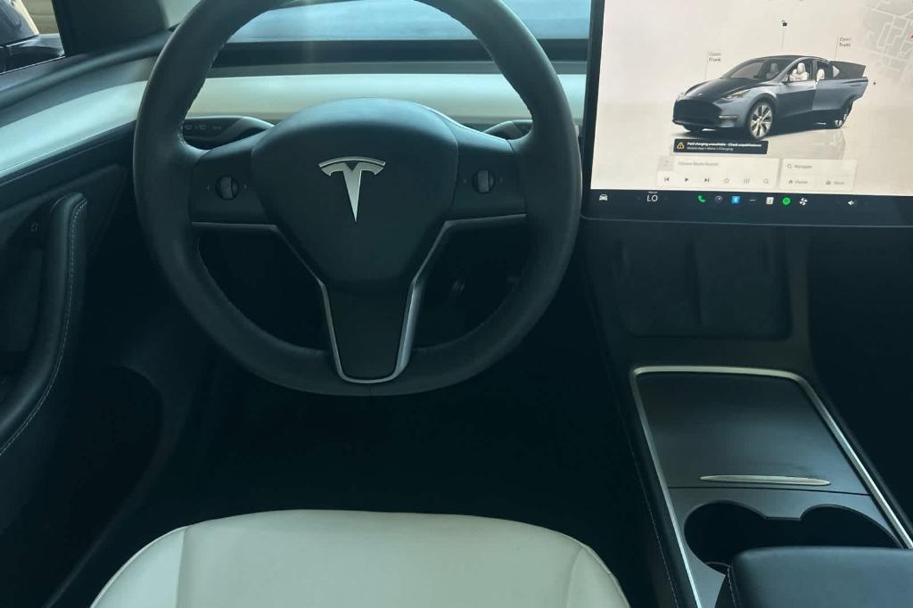 used 2024 Tesla Model Y car, priced at $34,948