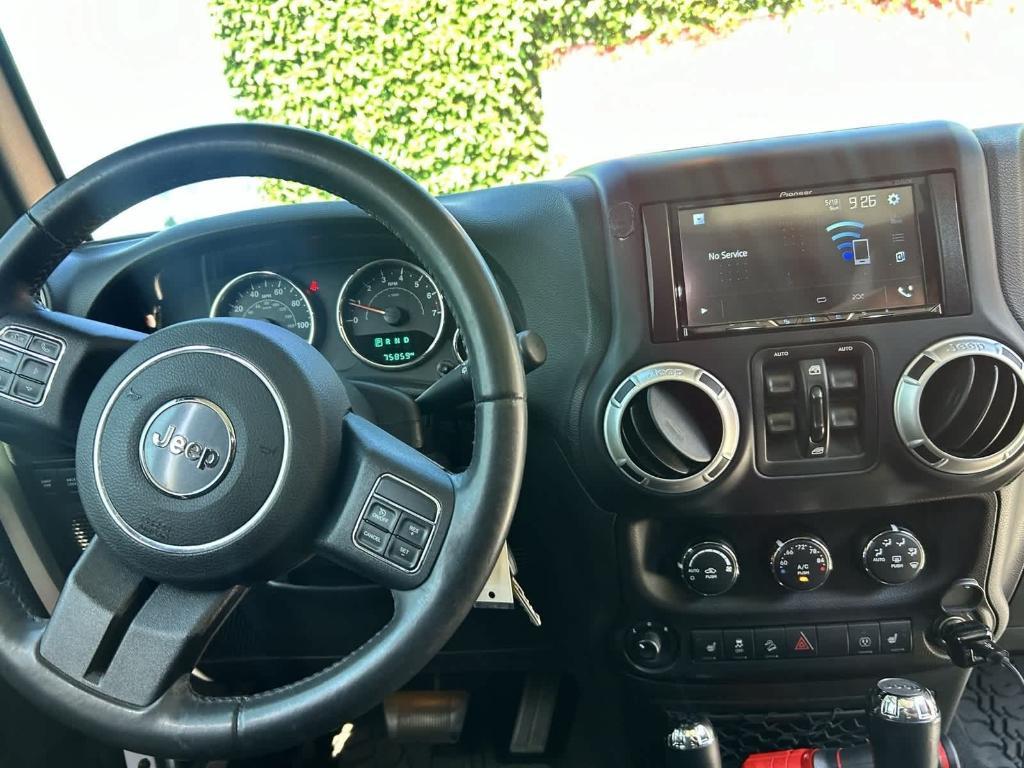 used 2017 Jeep Wrangler Unlimited car, priced at $26,214