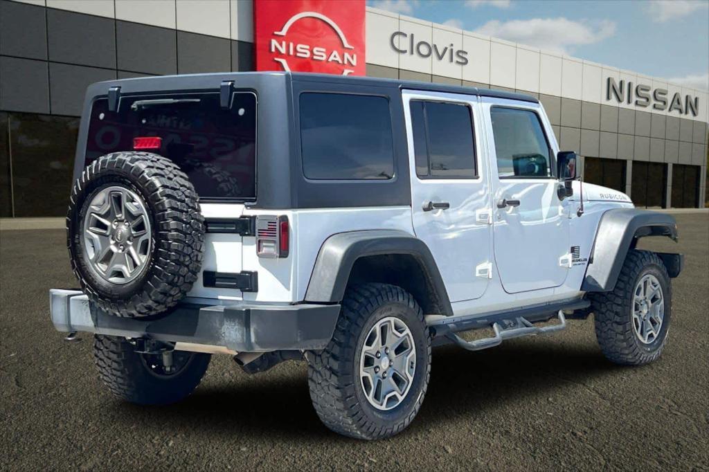used 2017 Jeep Wrangler Unlimited car, priced at $25,563