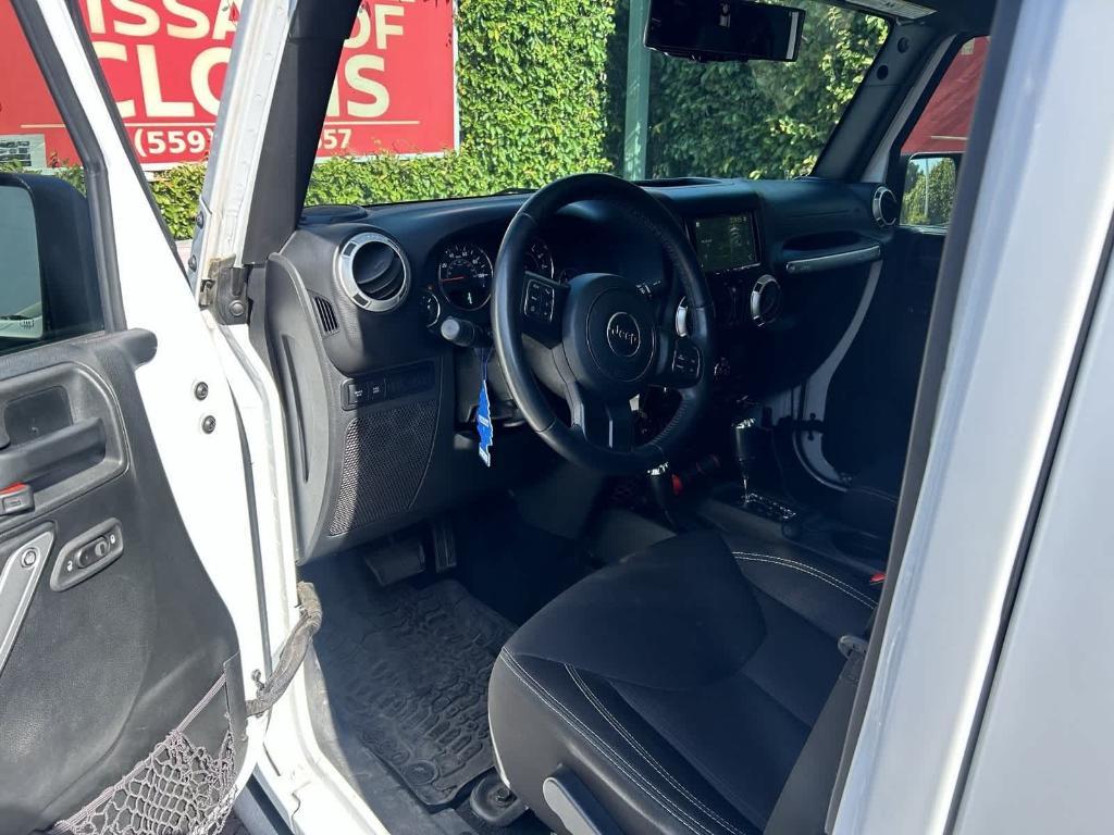 used 2017 Jeep Wrangler Unlimited car, priced at $26,214