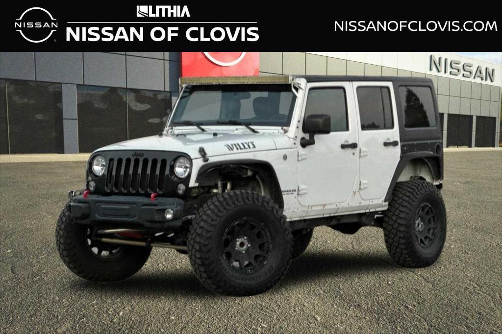 used 2016 Jeep Wrangler Unlimited car, priced at $21,758