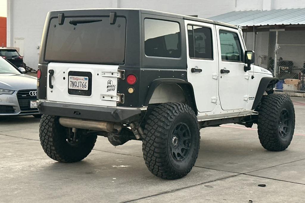 used 2016 Jeep Wrangler Unlimited car, priced at $21,758