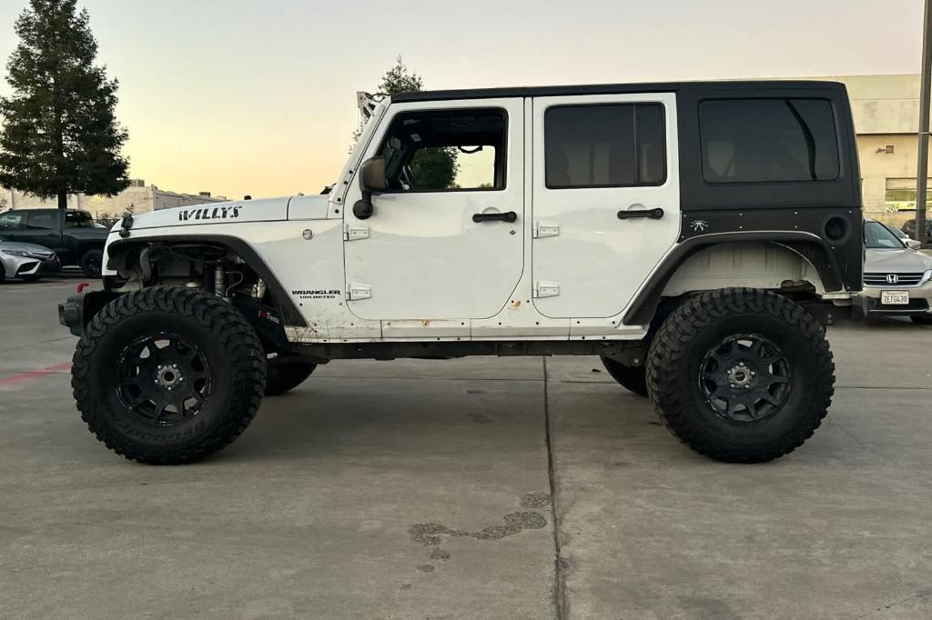 used 2016 Jeep Wrangler Unlimited car, priced at $21,758