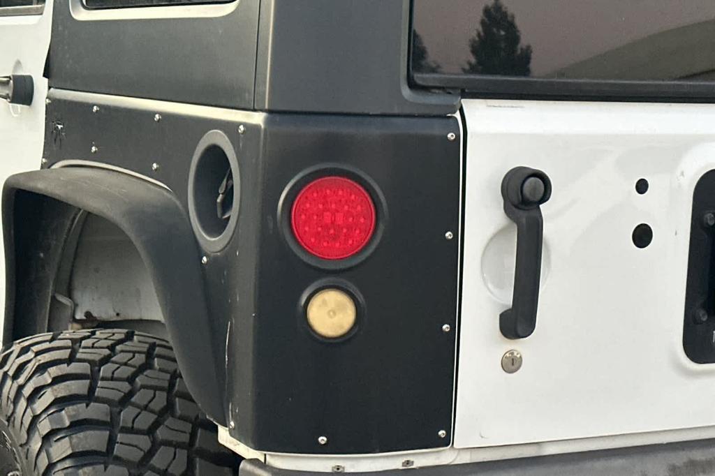 used 2016 Jeep Wrangler Unlimited car, priced at $21,758