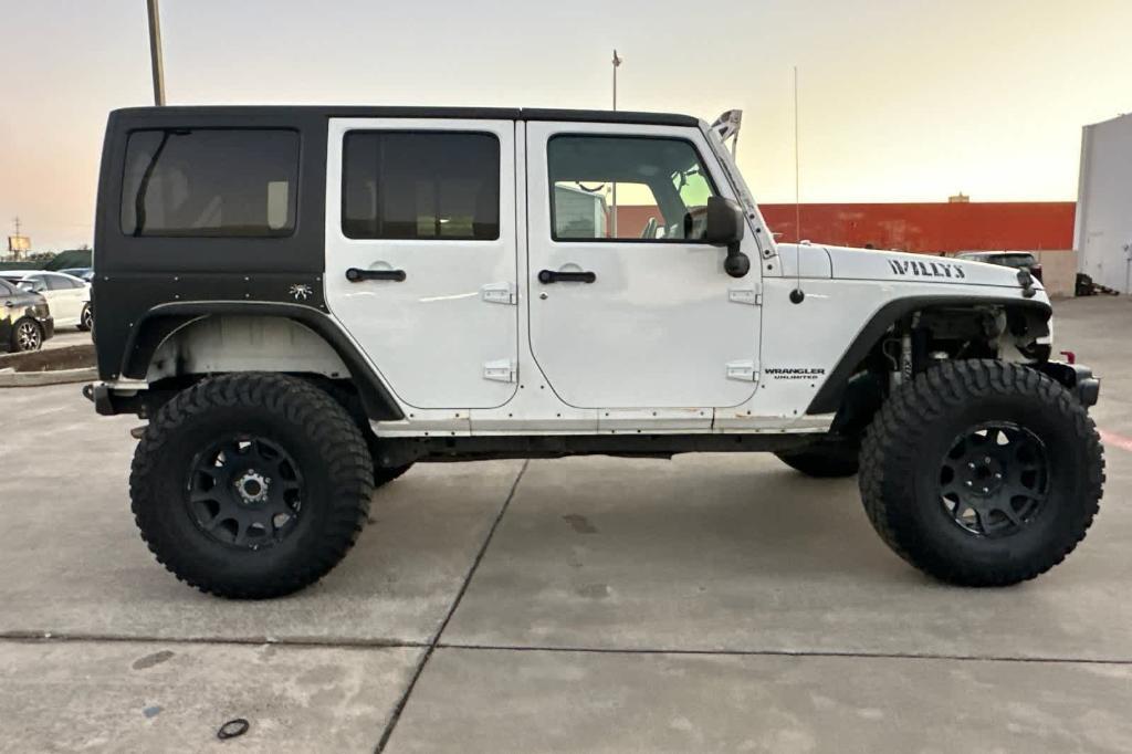 used 2016 Jeep Wrangler Unlimited car, priced at $21,758