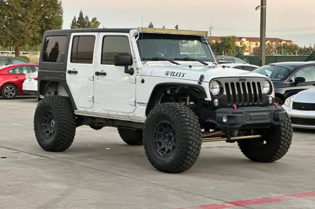 used 2016 Jeep Wrangler Unlimited car, priced at $21,758