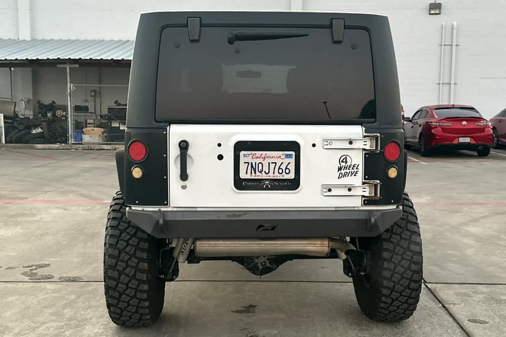 used 2016 Jeep Wrangler Unlimited car, priced at $21,758