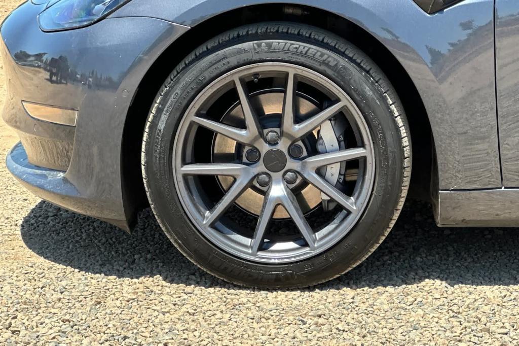 used 2022 Tesla Model 3 car, priced at $27,172