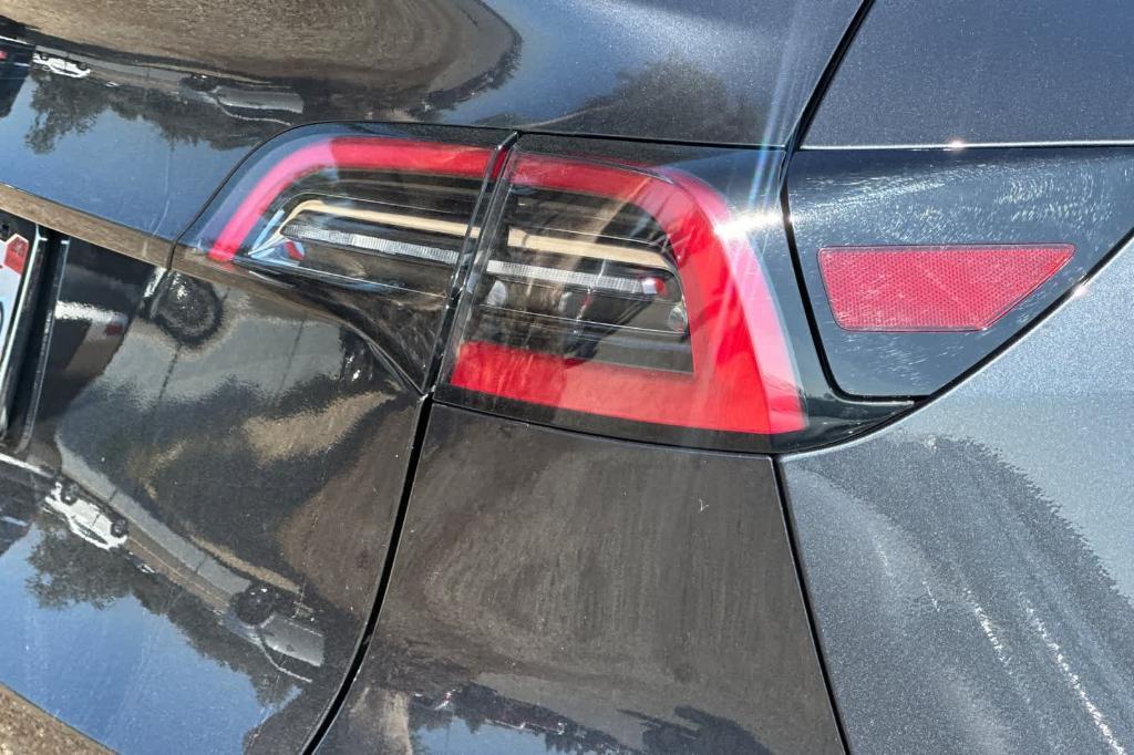 used 2024 Tesla Model Y car, priced at $30,544