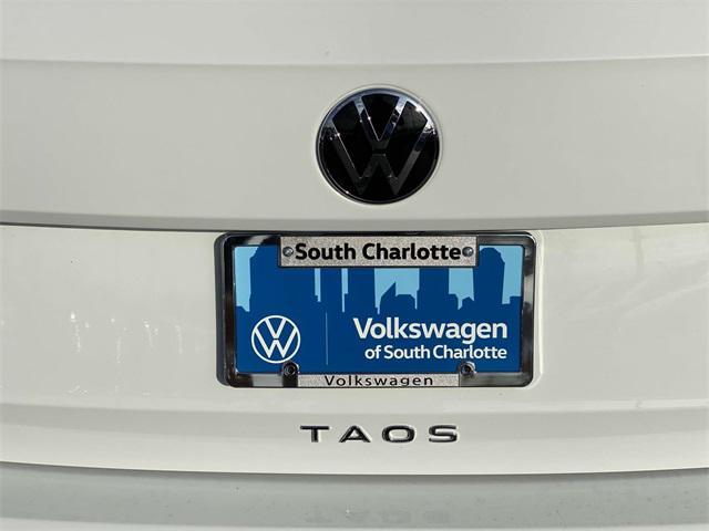 new 2024 Volkswagen Taos car, priced at $34,131