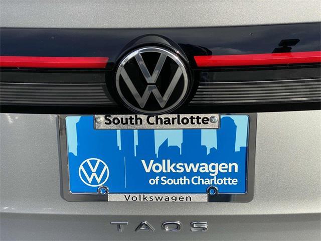 new 2025 Volkswagen Taos car, priced at $27,011