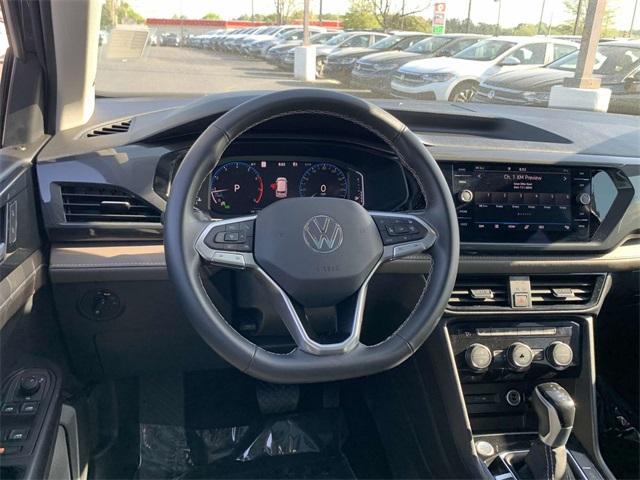 used 2023 Volkswagen Taos car, priced at $29,348