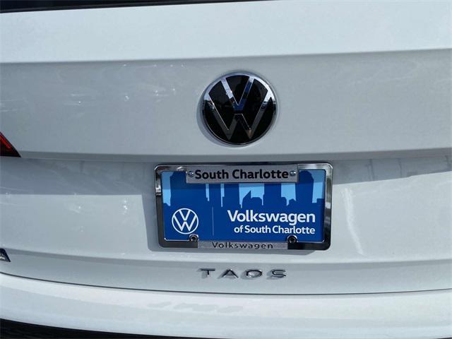 new 2024 Volkswagen Taos car, priced at $26,011