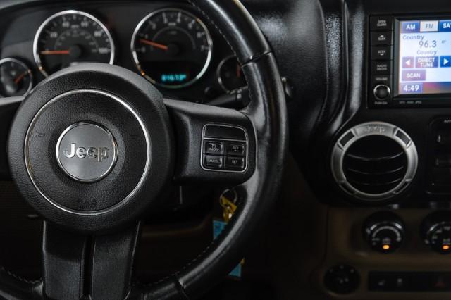 used 2015 Jeep Wrangler Unlimited car, priced at $19,596