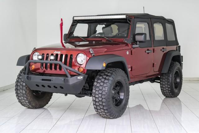 used 2010 Jeep Wrangler Unlimited car, priced at $15,596