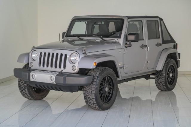 used 2014 Jeep Wrangler Unlimited car, priced at $21,996
