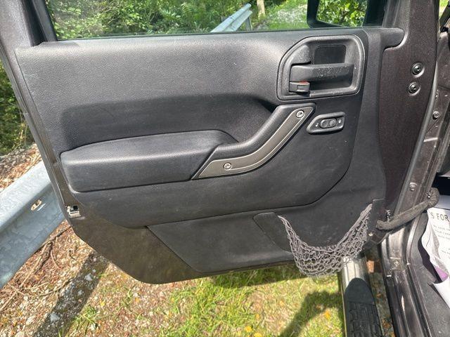 used 2014 Jeep Wrangler Unlimited car, priced at $12,246