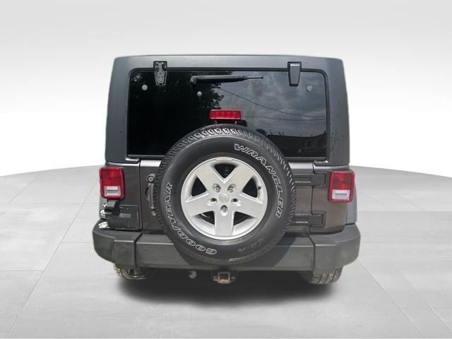 used 2014 Jeep Wrangler Unlimited car, priced at $12,246